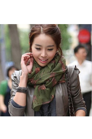Scarf in green with zebras pattern